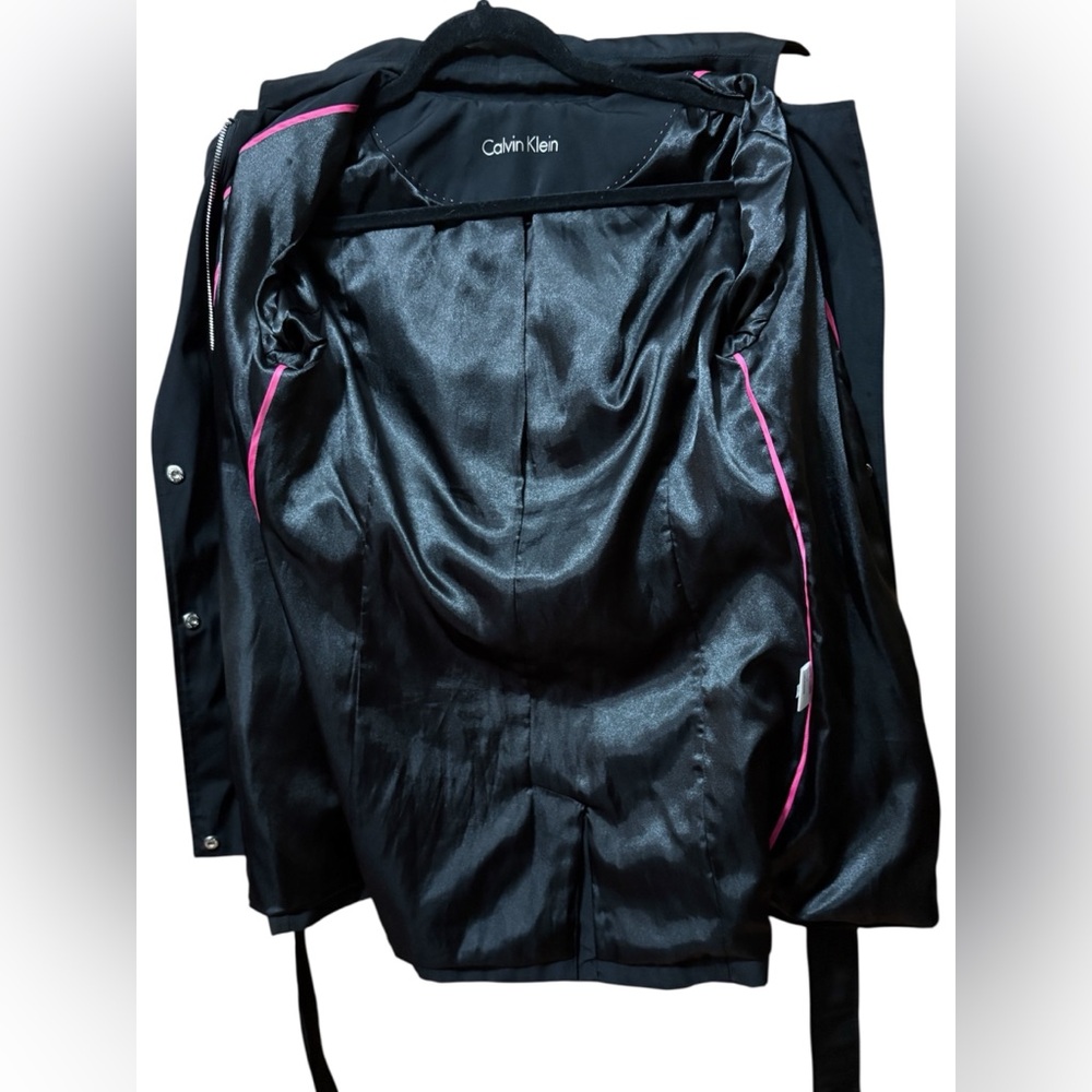 Calvin Klein-Classy black trench coat. Size small. Silver details/Hood. Like new - Picture 13 of 16